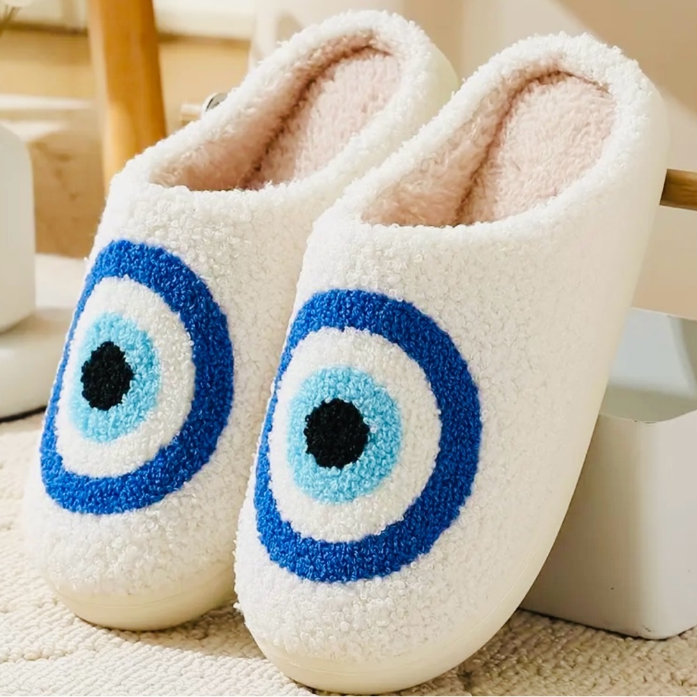 BEAUTIFUL White Slipper with Blue Eye